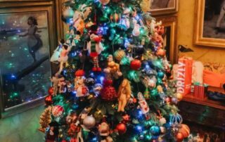 A beautifully decorated Christmas tree with colorful lights and ornaments.