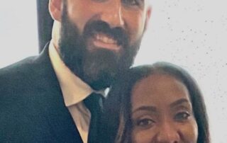 Happy couple in formal attire.