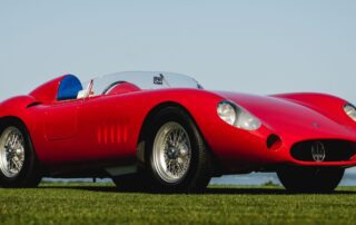 Red classic Maserati sports car.
