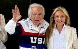 Ralph Lauren and wife in white.